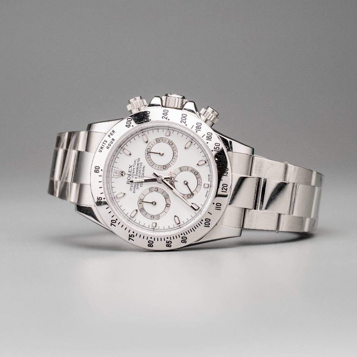 Đồng-Hồ-Nam-Rolex-Cosmograph-Daytona-White-116520-side Đồng-Hồ-Nam-Rolex-Cosmograph-Daytona-White-116520-side